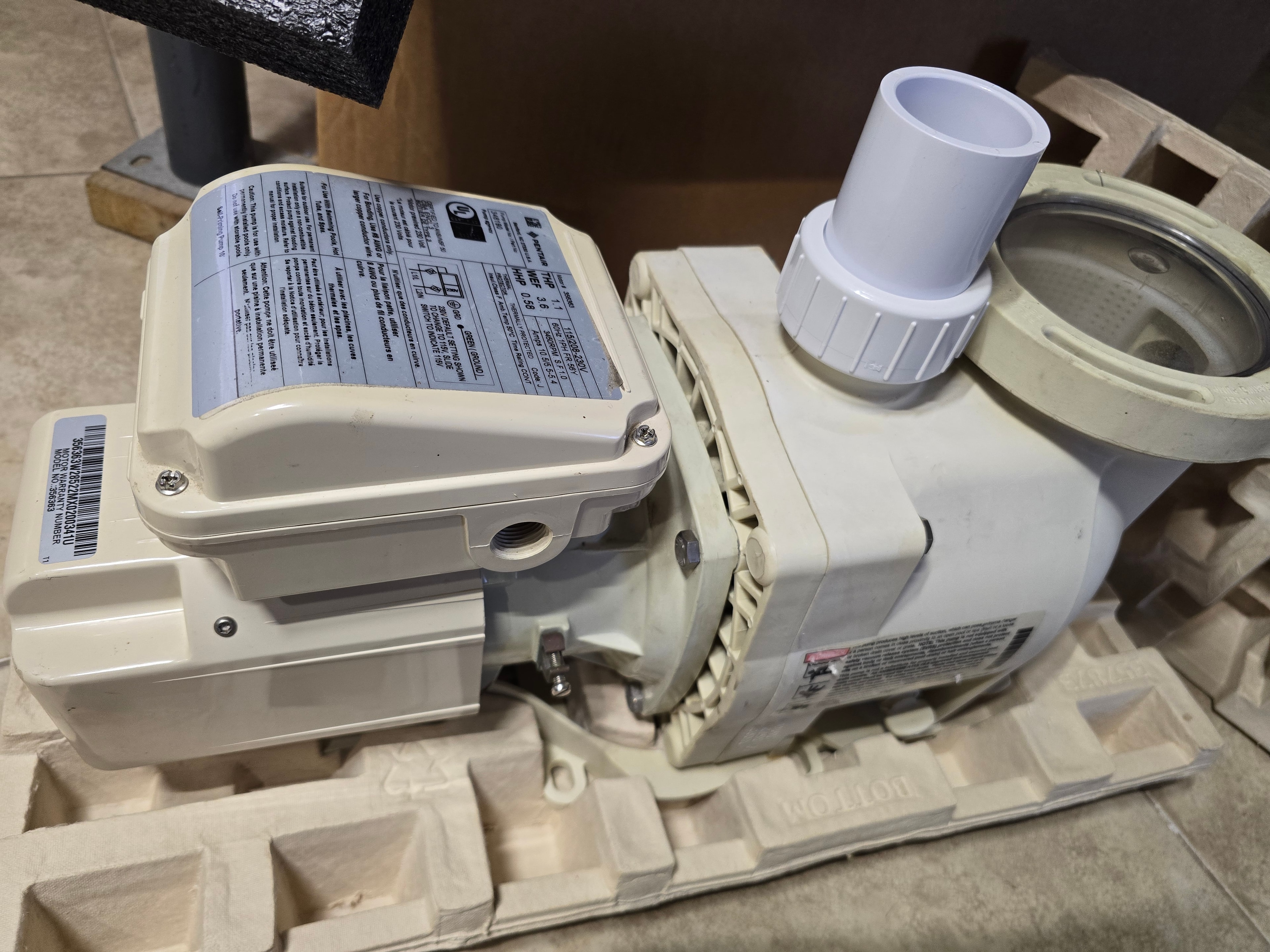 Pentair SuperFlo pump side view with instruction label